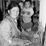 Women and child at loom in the Tibetan camp north of Pokhara