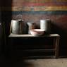 Metal buckets in Assembly Hall of Tsha Regional House