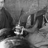 Tengboche Rimpoche (incarnate high Lama) blessing pilgrims,