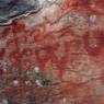 Red ochre inscription and symbols of the lower site.
