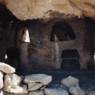 Cave with cut windows, domed recess and oblong niches.