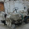 Agricultural tractor in storage in village