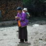 A woman with her baby in the village of sPyi pa, in Kong po