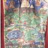 A thangka painting in {rad nis} Temple showing Mt. Kailash, the surrounding regions, and monasteries.