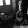 Tawa (young possible monk) at lunch at Puktal Gompa