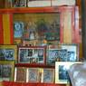 Small altar with various photos of Pha bong kha rin po che