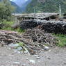 An area for storing wood in the village of sMu pa, in Kong po
