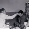 Household head gives Dasain tika to family members