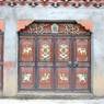 Intricately-decorated doors on building in Lhagang.