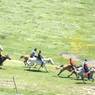 Young men racing horses in Lhagang.&nbsp;