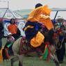 Tibetan man riding horse at Lhagang Horse Festival.&nbsp;