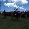 Tibetan men riding horses at Lhagang Horse Festival.&nbsp;
