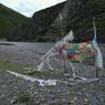 Prayer flags by the river in Lhagang.&nbsp;