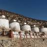 Row of stupas, called &ldquo;Auspicious Stupas&rdquo; (<em>bkra shis mchod rten</em>), at Lo Monastery.
