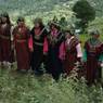 Beautiful womens dressed in Chha costume chanting after Bropon