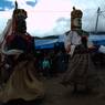Gonpo and Gonmo dance infront of Takila Guru statue