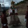 Gonpo Gonmo chham performed infront of Takila guru statue