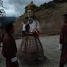 Gonmo dance by side of Guru statue at Takila