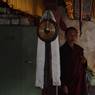 A Gong is hung by a pillar in the lhakhang