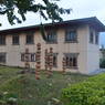 Back view of a class room building of Tendu School