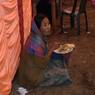 After the whole process of letting the bride enter the house a village elder rest in peace with her lunch