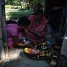 Women preparing for Lakshmi Puja
