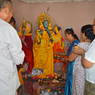 Villagers offering prayers inside the temple