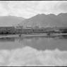 Lhasa during rainy season with Jokhang roof and flooded foreground. Copyright Pitt Rivers Museum, University of Oxford 1998.286.247
