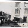 Street in Lhasa's Barkor with people and horses. Copyright Pitt Rivers Museum, University of Oxford 2001.35.162.1